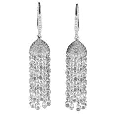 PANIM Diamond Briolette 18K White Gold Tassel Earrings Panim Diamond Briolette Tassel Earrings are a gorgeous and unique pair of earrings that are sure to make a statement. The earrings feature sparkling diamond briolettes, which are pear-shaped and faceted to catch the light from every angle. The briolettes are suspended from delicate gold links that create a tassel effect, adding movement and elegance to the earrings. The earrings are available in a range of lengths, allowing you to choose the Briolette Earrings, Gold Tassel Earrings, Vintage Drop Earrings, Flawless Diamond, Evening Outfit, Tassel Jewelry, Knot Earrings, Expensive Jewelry, White Gold Earrings