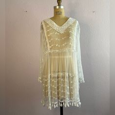 All White See Through, Cresent Bay Beach Cover Up Dress. New, Never Worn. Lond Sleeve, V-Neck, Gathered Skirt. Very Pretty With White Tassel’s Hanging From Both The Sleeves And Skirt. Size M, Mid Thigh Length. Beach Coverup Dress, White Tassel, Beach Covers, Gathered Skirt, Cover Up Dress, All White, Womens Swim, Cover Up, V Neck