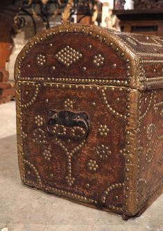 an old wooden box sitting on the floor