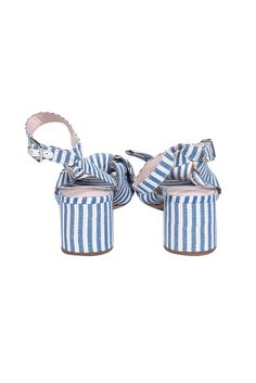 Step into summer in style with our Loeffler Randall blue and white stripe strappy sandals! These playful sandals feature a chic blue and white striped design and a cute bow detail on the front. Perfect for warmer months, they pair perfectly with a white poplin dress and a raffia crossbody bag for a fun and fashionable look. Grab a pair and step up your summer shoe game! Size 10 Leather sole and lining Ankle buckle strap Open toe Bow-front Heel height 2.5" Blue Slingback Sandals With Round Toe For Summer, Striped Open Toe Sandals For Summer, Striped Open Toe Casual Sandals, Casual Striped Open Toe Sandals, Blue Open Heel Slingback Sandals For Summer, Casual Striped Sandals For Beach, Blue Summer Sandals With Ankle Strap, Blue Slingback Sandals With Buckle For Summer, Blue Slingback Sandals With Buckle Closure For Summer