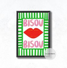 a red lipstick on a green and white striped background with the words bisov bisov