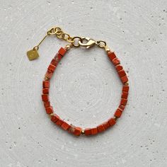 Simple unisex gemstone bracelet with Red Jasper cubes or a natural stone of your choice (see drop-down menu). The design is deliberately kept simple and makes a wonderful gift for a best friend. The gemstones are natural products. Each stone and each pearl is slightly different, which gives this piece of jewelry its special charm. LENGTH The total length is approximately 20 cm and, thanks to the extension chain, fits best on wrists between 16-18 cm in circumference. If you need a different lengt Modern Beaded Bracelets With Natural Stones, Modern Gemstone Beaded Bracelets For Gift, Modern Gemstone Beaded Bracelets As Gift, Modern Beaded Bracelets With Natural Stones For Gift, Modern Gemstone Beads Bracelet For Gift, Minimalist Natural Stone Beaded Bracelets For Everyday, Red Minimalist Beaded Bracelets For Everyday, Minimalist Red Beaded Bracelets For Everyday, Modern Adjustable Beaded Bracelets With Natural Stones