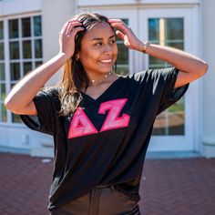 This trendy & unique Pink Marble Sunset Greek Letter Bella Canvas Slouchy V-Neck T-Shirt is sure to stand out on any campus! Grab one for you, your big/little, or a group of sisters Picture Details ⭑ #1-2: Black shirt, Neon Pink background Care Instructions ⭑ Wash inside out on cold & air dry for best results ⭑ Do not dry clean ⭑ Light iron if necessary ⭑ Care instructions are included with every order. We are not responsible for damages if not cared for properly. T-Shirt Info ⭑ Bella + Canvas S V-neck Spring College Tops, College Spirit Tops For Spring, Summer School Spirit Tops, School Spirit Tops For College Spring Season, Spring School Spirit Stretch Tops, Stretch Tops With School Spirit For Summer, Casual Black Tops For College Events, Black Summer Tops With School Spirit, Black Summer Tops With School Spirit Style