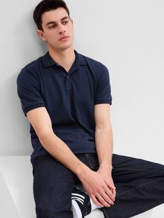 Stretch Pique Polo Shirt | Gap Factory Casual Collared T-shirt For Work, Navy Polo Collar Top With Buttons, Casual Cotton Button-up Henley, Casual Short Sleeve Polo Shirt With Buttons, Casual Henley With Buttons For Work, Casual Plain Cotton Polo Shirt, Classic Polo Shirt With Relaxed Fit, Navy Casual Polo Shirt Relaxed Fit, Casual Navy Relaxed Fit Polo Shirt