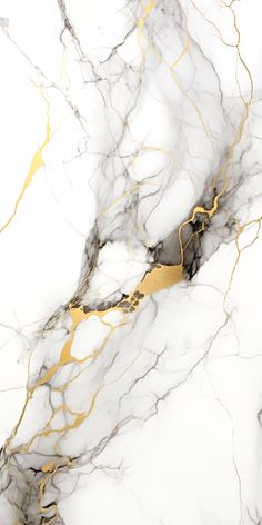 white marble with gold veining on it