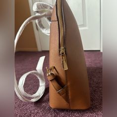 This Listing Is For A Nwt Leather Backpack By Michael Kors. It’s In The Color “Luggage” And Has Gold Hardware, Zippers And Logo. This Bag Had Never Been Used And Still Has The Foam Wrapping On The Backpack Straps. The Bag Pictured Is The Exact Bag Being Shipped Out. It Didn’t Come With A Dust Bag Nor Is In Its Original Box. It Is 100% Authentic And Has Been Kept In A Clean, Smoke Free Environment. Please Make Sure To View And Zoom In On All Photos To Determine The Condition Of The Bag. Sorry For Michael Kors Backpack, Flap Backpack, Super Speed, Medium Backpack, Black Leather Backpack, Small Backpack, Backpack Straps, Distressed Black Jeans, Backpack Purse