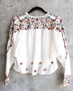 Free People Ava Embroidery Blouse - Ivory - shophearts Long Sleeve Tops With Floral Embroidery For Summer, Summer Long Sleeve Blouse With Embroidered Hem, Cream Folk Blouse With Long Sleeves, Cream Long Sleeve Folk Blouse, Bohemian Cream Long Sleeve Blouse, Long Sleeve Bohemian Cream Blouse, Long Sleeve Embroidered Blouse For Brunch, Embroidered Long Sleeve Blouse For Brunch, Off White Long Sleeve Bohemian Blouse