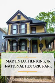 a yellow house with the words martin luther king jr national historic park