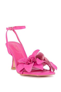 The Eliseo is a bright pink faux leather statement heel featuring an open toe with a flower embellished foot strap. This heel is completed with an adjustable ankle strap for a secure fit. Heels Colorful, Bright Pink Heels, Pink Stilettos, Flower Sandals, Pink High Heels, Fun Heels, Sandal Platform, Stiletto Sandals, Pink Heels