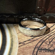 "Discover Unique Cremation Rings: Artisan Crafted with Visible Ash, Birthstone Colors - Memorialize with Beauty and Love.\" Introducing FETSTAN's artisan-crafted Cremation Rings, where each piece tells a story and honors a memory. My handcrafted rings are not just jewelry but a heartfelt tribute to your loved ones. With visible ash encased beautifully, each ring is a tangible connection to the memories you cherish. Please follow these Simple Steps before you buy my rings (I am in Montreal Canada):  1- To get started, message me below. I will provide the address in Montreal, Canada where you can send your cremated ash before making a purchase. 2- I will confirm receipt of your items and discuss your ring design. Afterward you can purchase my ring and the process of creating oyur jewellery w Artisan Engraved Ring For Anniversary, Artisan Nickel-free Rings For Anniversary, Artisan Untreated Wedding Jewelry, Artisan Engraved Ring For Gift, Artisan Untreated Jewelry For Wedding, Artisan Engraved Wedding Rings, Artisan Adjustable Rings For Anniversary, Cremation Rings, Ashes Ring