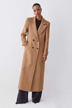 Crafted With Sumptuous Italian Wool, This Longline Coat Adds A Layer Of Sophistication To Every Ensemble. Notched Lapels Give Classic Appeal, While Double-Breasted Buttons And Side Pockets Provide Functionality.Style: Coatfabric: Woollength: Longlineneckline: Collaredsleeve Length: Long Sleeve Fall Double-breasted Wool Coat With Double Button, Elegant Long Wool Coat With Double Button Closure, Formal Fall Wool Coat With Double-breasted Button, Formal Double-breasted Wool Coat For Fall, Chic Brown Wool Coat With Double-breasted Buttons, Chic Brown Wool Coat With Double-breasted Button Fastening, Fall Double-breasted Notch Lapel Wool Coat, Timeless Notch Lapel Wool Coat For Fall, Chic Double-breasted Wool Coat With Notch Lapel