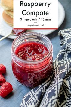 raspberry compote in a mason jar on a table