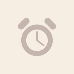 an alarm clock icon on a beige background