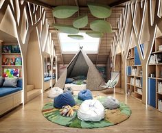 the children's room is decorated in wood and has lots of bookshelves