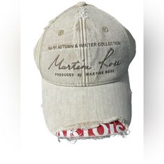 Rare Martine Rose X Stella Artois Collaborative Collection Exposed Brim Cap 6 Panel Construction Distressed Finish Torn Peak Exposing 'Stella Artois' Logo Print Adjustable Rear Strap Color: Off-White Material: 100% Cotton Unisex Creative Hats, Rose Accessories, Designer Caps, Rose Hat, Distressed Baseball Cap, Martine Rose, Rose Cream, Stella Artois, Album Art Design