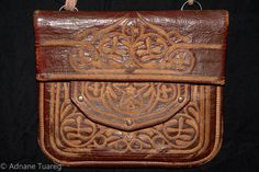 Old leather African Moroccan satchel bag with flap decorated with tribal embroideries. Hand-tooled in Marrakech, this is an old antique man shoulder slim bag, merchants in Morocco when travelling used this bag under their coat to put their money and valuables. This messenger shoulder leather African bag is one of a kind and reflect the folk artwork of the Berber Tribes of Morocco. Dispose de ------ Matériel ◈ : cuir leather Région de ◈ : Afrique, Afrique du Nord, Maghreb, Maroc, vallée du Draa L Man Shoulder, Silver Engraved Bracelet, African Bag, Engraved Bracelet, Silver Bangle Bracelets, Old Antiques, Satchel Bag, Silver Bangles, Marrakech