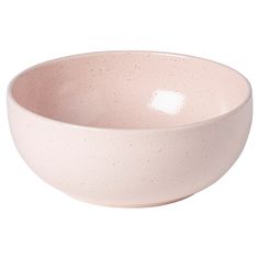 a pink bowl with speckles on the rim is shown in front of a white background