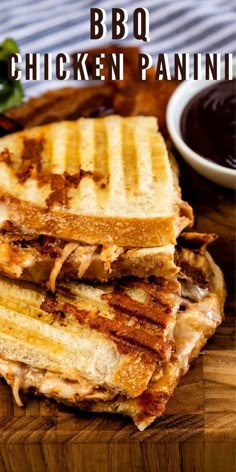 grilled chicken panini cut in half on a cutting board