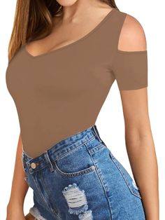 This Elegant Short Sleeve Top combines modern style with comfort, perfect for those who value a sleek, minimalistic look. Featuring a distinctive cut-out design, it stands out as an ideal option for casual and semi-formal events. Features: Material: Made from a soft, stretchable fabric blend that balances comfort and durability. Special Features: Features a distinctive cut-out and a deep V-neckline for an elegant appearance. Technical Specifications: Slim fit design to enhance the silhouette whi Casual Fitted Cutout Tops, Casual Stretch Tops With Cutout Details, Casual Stretch Cutout Tops, Jumpsuit Winter, Cut Out Design, Dress Robes, Knit Set, Cozy Knits, Blazer Coat