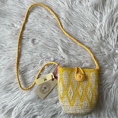 En Shalla Crochet “Bag 44l00” From Anthropologie Crossbody Hand-Crocheted Bucket Bag. Leather Braided Strap. Detailed Button Closure. Leather Label Inside. Crochet Bag. Woven Leather Shoulder Strap. Closure With Worked Button. Internal Leather Logo Label. 45% Dried Palm & 45% Nylon | 100% Lamb Leather Approx Size: 20 X 16 X 8 Cm (7.85” X 6.3” X 3.15”) | Strap Full Length: 110 Cm (43.3”) Born In Morocco & Bred In London New With Tags Retail: $138 Inventory: Mfeb*Mv Casual Yellow Crochet Woven Bag, Casual Yellow Crochet Bag With Braided Handles, Summer Yellow Crossbody Bag, Yellow Pouch Shoulder Bag With Mobile Phone Pocket, Yellow Pouch Bag For Mobile Phone, Casual Yellow Shoulder Bag With Braided Handles, Casual Yellow Handmade Straw Bag, Casual Yellow Bucket Bag For Daily Use, Casual Yellow Woven Bag