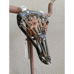 a horse's head made out of assorted metal parts