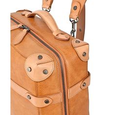 Durable, versatile and stylish. The Speedwell Trunk Backpack is the best travel trunk you will find. Handcrafted genuine leather keeps it's shape whether fully loaded or empty. Carry it as a backpack by the shoulder straps or by the handles as a travel trunk. The Speedwell Trunk Backpack will be a favourite traveling companion for years to come..Material: 100% genuine leather, 100% vegetable base dyes, 100% interior cotton lining.Measurements - small sized bag, 12' W x 16' H x 5.75' D.Strap type Luxury Leather Rectangular Backpack For Trips, Luxury Rectangular Leather Backpack For Trips, Luxury Leather Backpack For Trips, Luxury Leather Backpack For Travel, Luxury Leather Backpack For Travel In Cognac, Luxury Leather Backpack With Leather Trim, Luxury Cognac Leather Backpack For Travel, Luxury Cognac Leather Travel Backpack, Luxury Backpack With Luggage Sleeve For Trips