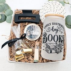 a gift box filled with books and other items