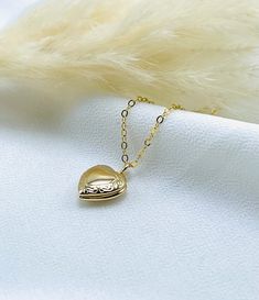 This heart shaped photo locket is very cute and delicate perfect for everyday wear. Dainty heart locket, Minimalist heart locket, Vintage photo locket necklace, Love locket necklace, medallion locket, Small heart locket, Gold heart locket, gift for her  -------------------------------------- DETAILS  * Locket material: 18k gold plated  * Size: 10.5mm x 12mm * Chain Material: 14k gold filled  * Chain length: Choose from drop down menu  * Chain style: Cable, Satellite, Paperclip  * Choose Your favorite style from drop down menu  SHIPPING  * Free domestic shipping on all orders  PACKAGING  * All pieces comes beautifully and carefully packaged in a jewelry box  * Feel free to ask any questions regarding this item! Thank you 🌸 Dainty Locket Necklace Pendant As Gift For Her, Dainty Locket Pendant Necklace As Gift For Her, Dainty Pendant Locket Necklace As Gift For Her, Dainty Everyday Locket Necklace, Dainty Pendant Locket Necklace, Dainty Locket Necklace With Delicate Chain For Gift, Everyday Heart Locket Necklace For Valentine's, Dainty Heart Locket Necklace With Delicate Chain, Dainty Double Heart Locket Necklace