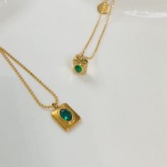 This minimalist necklace is designed with a charming emerald pendant measuring 8mm x 9mm (0.8cm x 0.9cm), this necklace offers understated beauty that complements any outfit. The adjustable chain allows for versatile styling, ranging from 42cm to 45cm in length, ensuring a perfect fit for every neckline. *18ct gold-plated tarnish-free chain necklace *Green stone beaded chain *Waterproof emerald zircon square pendant *Elegant and durable design *Tarnish-free and water-resistant *Ideal for women o Emerald Necklace With Delicate Chain As Gift, Emerald Necklace With Delicate Chain For Gift, Gold Emerald Birthstone Necklace In Minimalist Style, Gold Minimalist Emerald Birthstone Necklace, Minimalist Gold Emerald Birthstone Necklace, Everyday Yellow Gold Emerald Necklace, Minimalist Gold Emerald Gemstone Necklace, Minimalist Emerald Necklace Clavicle Chain As Gift, Minimalist Emerald Clavicle Necklace As Gift