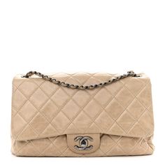 This is an authentic CHANEL Glazed Calfskin Quilted Large Coco Soft Flap in Beige. This chic shoulder bag is crafted of glazed, aged, diamond-quilted calfskin leather in beige. The bag features a leather-threaded aged ruthenium chain link shoulder strap, and a matching ruthenium classic CC turn lock on the crossover flap. This has accordion sides and opens to a two-compartment partitioned natural fabric interior with zipper and flat pockets. This elegant flap bag has room for all of your day or Designer Quilted Beige Shoulder Bag, Luxury Quilted Cream Shoulder Bag, Beige Quilted Leather Shoulder Bag, Cream Bags With Cc Turnlock Closure, Handbag Display, Chanel Shoulder Bag, Diy Handbag, Handbags Affordable, Heart Bag