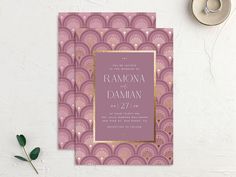 a pink and gold wedding card with an art deco design