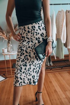 Ready to make a statement? Our Animal Print Knit Midi Skirt is designed to fit true to size and features a striking cheetah print, a comfortable knit base, an elastic waist, and a sultry side split. It's the perfect blend of style and comfort, suitable for any occasion or lounging in style. Dare to embrace the wild! 🐆👗 #AnimalPrintSkirt #MidiSkirt #WildFashion Chic Leopard Print Bottoms For Day Out, Stretch Leopard Print Pencil Skirt, Fitted Elegant Leopard Print Skirt, Elegant Fitted Leopard Print Skirt, Chic Leopard Print Pencil Skirt, Leopard Print Stretch Pencil Skirt, Chic Leopard Print Skirt For Fall, Chic Leopard Print Skirt For Day Out, Chic Leopard Print Stretch Skirt