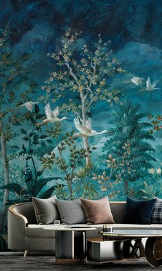 a living room scene with birds flying over the trees