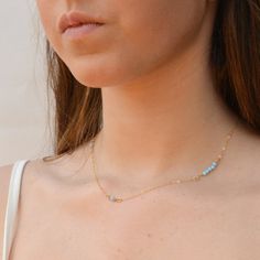 Opal necklace,opal bead necklace,dainty opal necklace,14k gold filled,minimalist necklaceClassic Gold filled /sterling silver necklace with tiny opal beads.Dainty necklace with lots of style. Very trendy and chic minimalist necklace.Perfect for everyday and layered with more. This necklace is perfect for yourself, giving as a special gift, or bridesmaid necklaceOpal bead 3mm Model wearing 16" lengthIf you would like this chain altered, please convo me. All my jewelry are packed in an elegant gif Dainty Opal Necklace, Coupon Organizer, Necklace Opal, Rose Gold Chain, Opal Beads, Bridesmaid Necklace, Anger Management, Necklace Blue, Discount Fabric