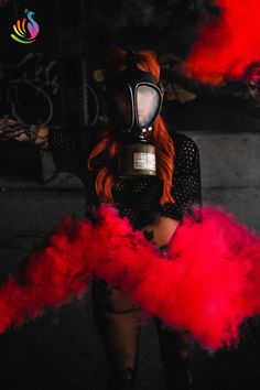 Red smoke bomb photography is a great way to add flair to the spooky holiday season! Purple Teal, Graduation Pictures, Halloween Wedding, How To Pose, Unique Photo, Gender Reveal Party