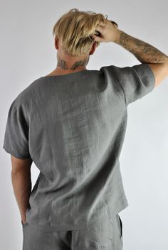 Comfort is a men's best friend so here I present you with the ultimate of comfort that men can get! Not just another boring t-shirt. It is a super quality linen top that will never allow you to sweat as the fabric absorbs body moisture better that any fabric on earth. It is made of 100% linen! Non stretchy and wrinkles beautifully as quality linen suppose to. Matching pants available separately here: https://www.etsy.com/uk/listing/866128040/mens-linen-pants-linen-tracksuit-bottoms?ref=shop_home Gray Relaxed Fit V-neck Shirt, Solid Linen V-neck Shirt, Linen V-neck Shirt, Summer Gray Linen Top, Linen Tracksuit, Mens Linen Pants, Beach Kaftan, Pants Linen, Linen Lights