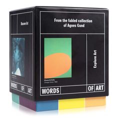 the boxed box contains four different colored squares with words on them and an image of a woman's face