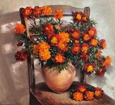 a painting of flowers in a vase on a chair