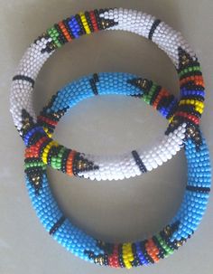 African Beaded Bracelets, Masai bracelets, African Jewelry, Zulu Bracelets, Tribal Bracelets, Moms g Handmade Blue Beaded Bracelets For Festivals, Traditional Blue Beaded Bracelets For Festivals, Handmade Blue Beaded Bracelet For Festivals, Traditional Beaded Bangle Bracelets With Tiny Beads, Traditional Beaded Bangle Bracelet With Tiny Beads, Traditional Tiny Beaded Bangle Bracelets, Traditional Bangle Bracelet With Tiny Beads, Hand-strung Round Beaded Bracelets For Festival, Multicolor Hand-strung Round Beaded Bracelets