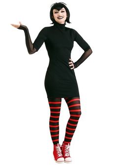 a woman in black and red striped tights with her hands out to the side