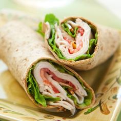 there is a wrap with meat and lettuce on it