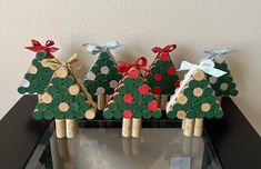 three christmas trees made out of wine corks