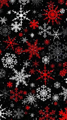 red and white snowflakes on black background