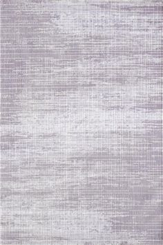 an area rug with grey and white colors