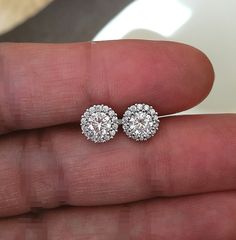 These Halo Diamond Stimulants Stud Earrings are one of a kind. They look fabulous and beautiful when worn. This pair of Round cut or Round shape simulated diamonds is excellent cut, Bright White D Color, and VVS1 Purity. These Earrings feature screw backs for secure locking. Comes with a perfect Gift Box, Ideal for Gifting. A great Valentines gift for Valentine's day for your Valentine's love. Ultra-luxurious and sophisticated this dramatic diamonds Stimulant Halo earrings studs are made of ster Round Diamond Earrings, Halo Diamond Earrings, Halo Stud Earrings, Halo Earrings, Halo Earrings Studs, Classic Earrings, Diamond Earring, Diamond Stud Earrings, Women Diamond