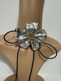 Silver leather  flower choker unique and stylist will be perfect for casual wear or any special occasions  Choker length 58 inches long  2.5mm waxed cotton cord  Flower size:4 inches diameter  Adjustable  Return & exchanges We gladly accept cancellations Request a cancellation within 4 hour of purchase.  We don't accept return or exchanges but please contact us if You have any questions or any problem with your orders Thank you for shopping with us ♥️ Stay safe & healthy Spring Festival Adjustable Necklace, Flower Shaped Choker For Spring Gift, Flower Choker For Spring Gift, Spring Choker As Gift, Spring Flower Choker As A Gift, Flower Shaped Spring Choker For Gift, Flower Shaped Spring Choker As Gift, Handmade Spring Choker As A Gift, Flower Shaped Choker For Spring Party