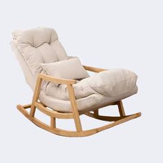 a rocking chair with a pillow on it