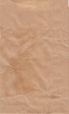 a piece of brown paper that is on the ground