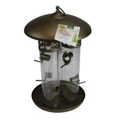 a bird feeder with two birds on it's sides and a tag hanging from the top