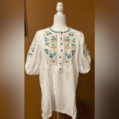 Boutique Purchase-White Tunic Top With Embroidered Accents To The Front And Sleeves. Size Xl Measurements In Photos New-Never Worn White Casual Top With Embroidered Neckline, Casual White Tops With Embroidered Neckline, Casual White Top With Embroidered Neckline, White Folk Style Top For Vacation, White Embroidered Cotton Top For Vacation, White Embroidered Blouse For Vacation, White Embroidered Short Sleeve Top With Relaxed Fit, Casual White Blouse With Geometric Embroidery, White Embroidered Top With Relaxed Fit